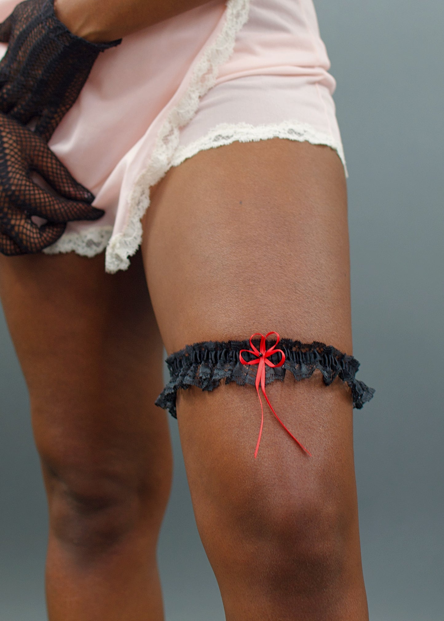 The Desire Black Garter with Red Bow Detail